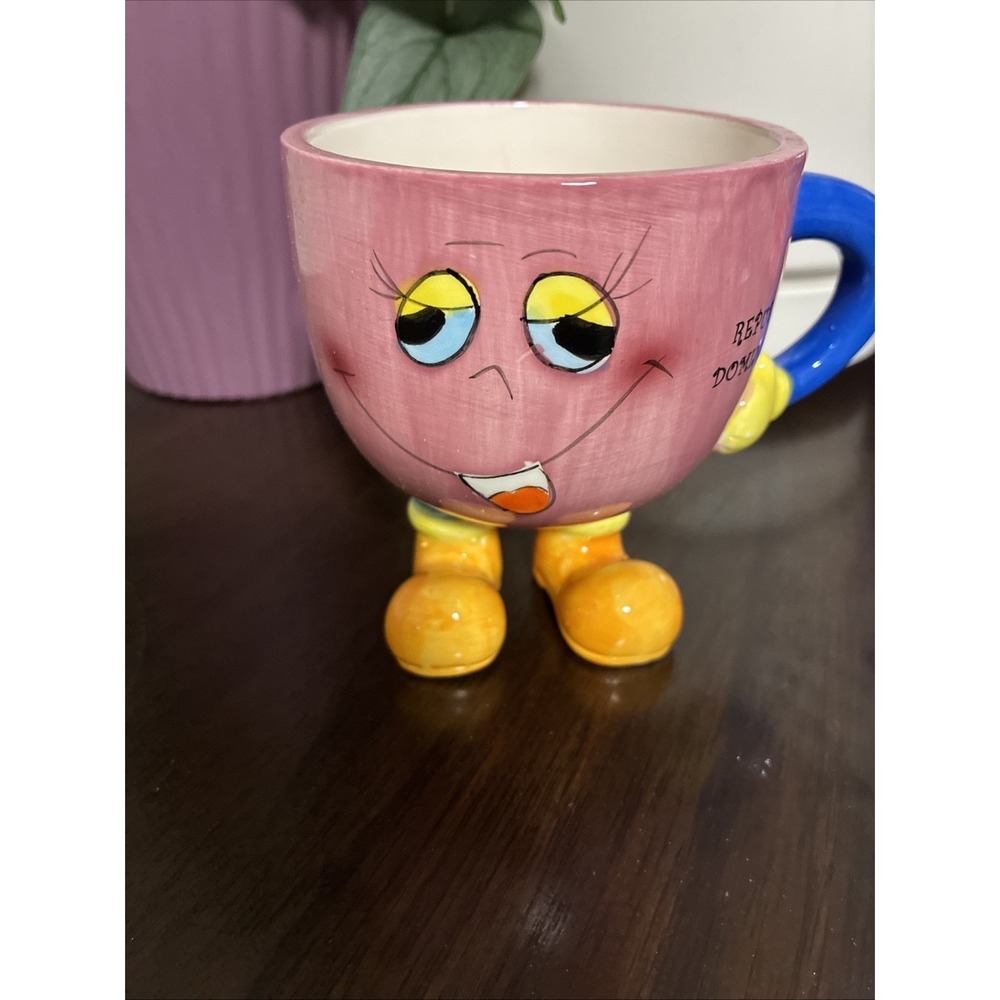 vintage novelty face tea/ coffee cup with feet . Pinkcolor